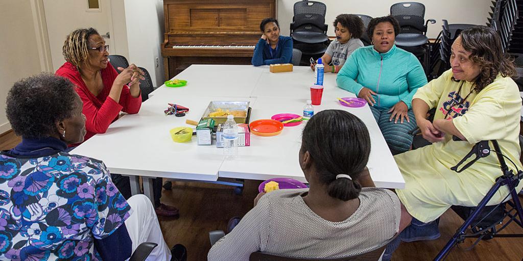 a group of women at a meeting