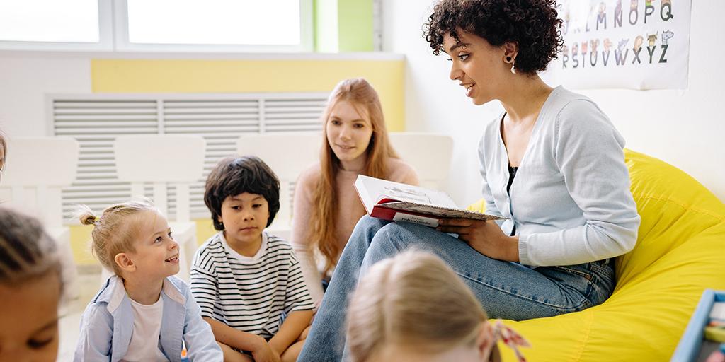 a teacher reads to her class